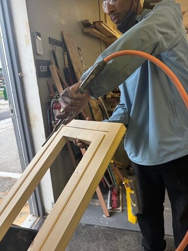 Removing debris with air tool